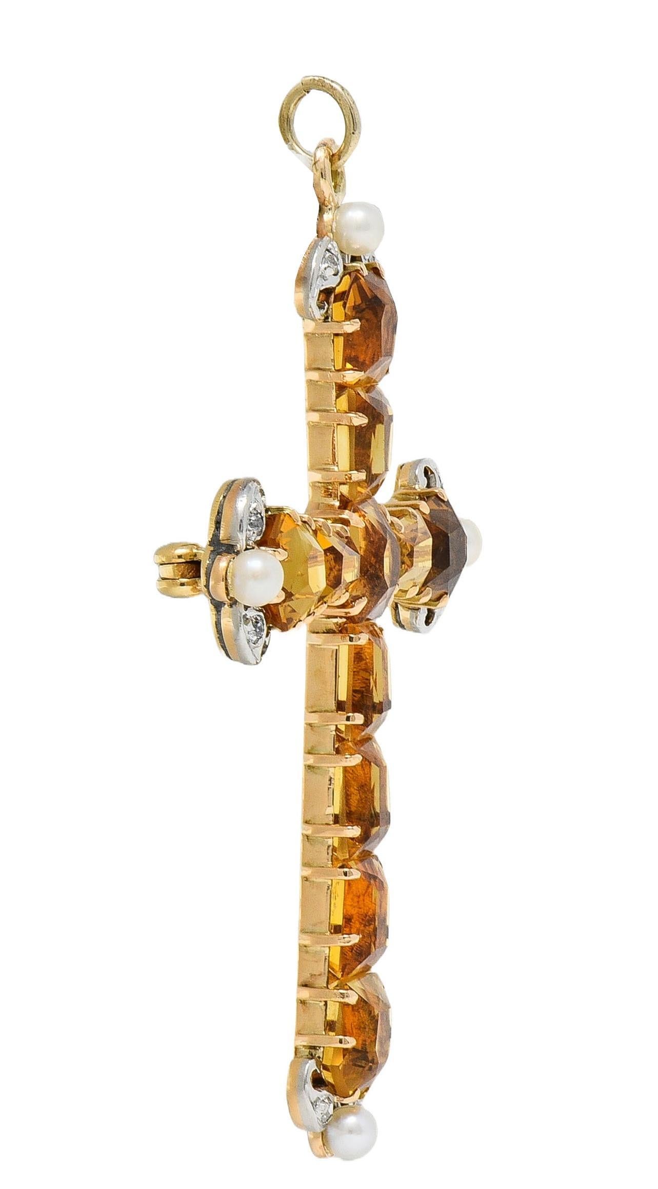 Designed as a cross form with flaring terminals prong set throughout with citrines
Octagonal, hexagonal, and trapezoid cut - weighing approximately 11.80 carats 
Transparent light to medium brownish orange in color 
Accented by platinum-topped