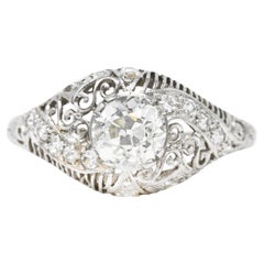Edwardian 1.25 Carats Old Mine Diamond Platinum Scrolled Engagement Ring