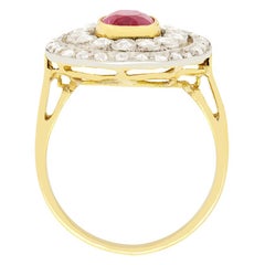 Edwardian 1.30 Carat Ruby and Diamond Double Halo Ring, c.1910s
