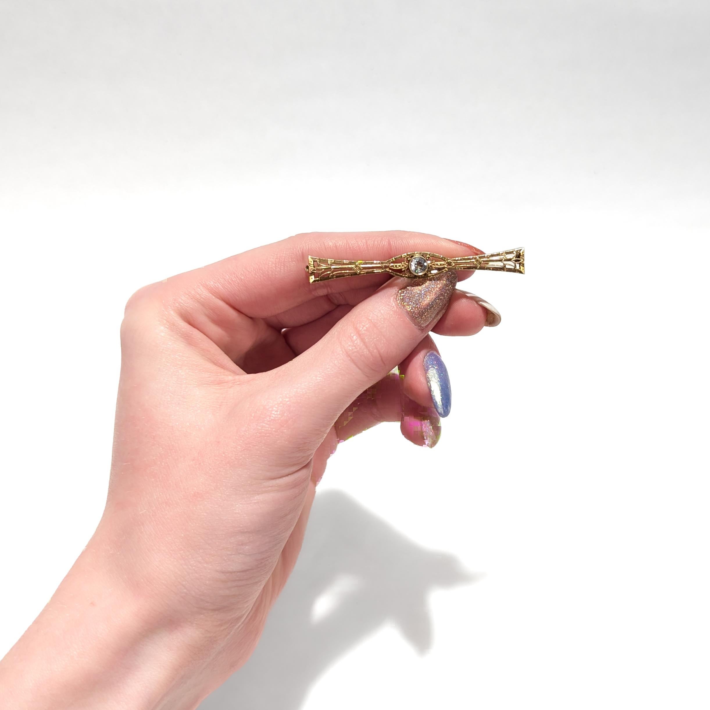 Round Cut Edwardian 14 Karat Gold and Aquamarine Filigree Bow Tie Brooch or Pin For Sale
