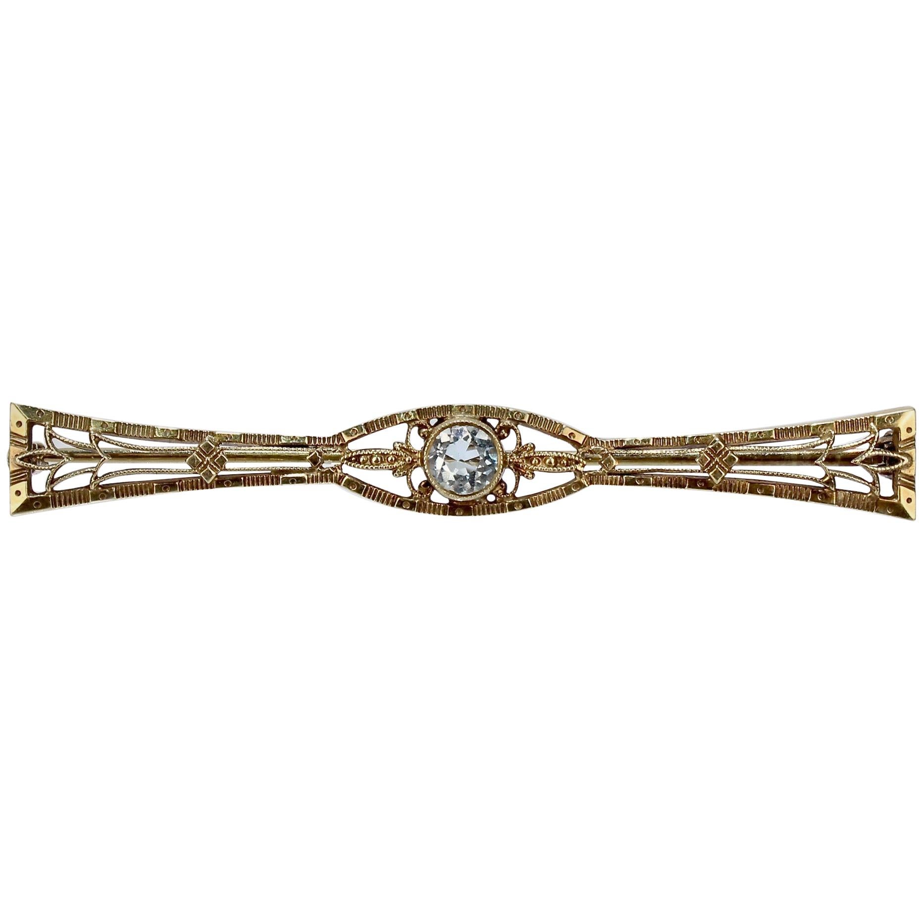 Edwardian 14 Karat Gold and Aquamarine Filigree Bow Tie Brooch or Pin For Sale