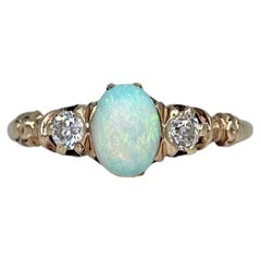 Edwardian 14 Karat Gold Cabochon Cut Opal Diamond Three Stone Ring