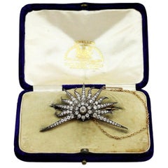 Antique Edwardian 14 Karat Gold, Silver, and Diamond Starburst Brooch