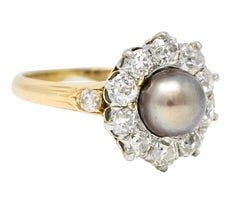 Edwardian 1.40 Carats Diamond Natural Pearl Platinum-Topped 14 Karat Gold Ring