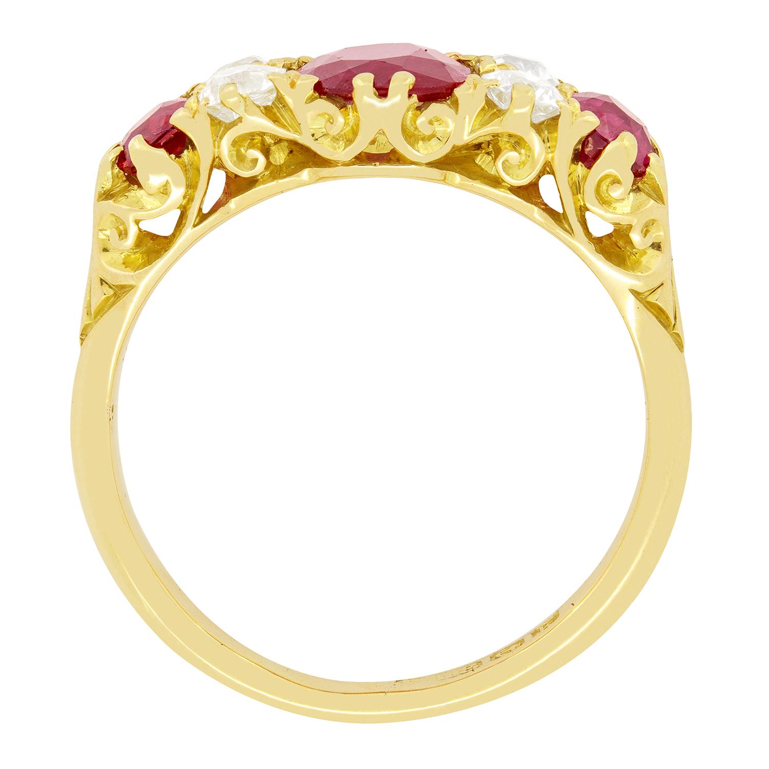 A trio of gorgeously coloured rubies are in prominent display in this Edwardian ring. The central ruby is the biggest at 0.80 carat, whilst the ones at each end are 0.30 carat a piece. In between these rubies are four old cut diamonds, claw set in