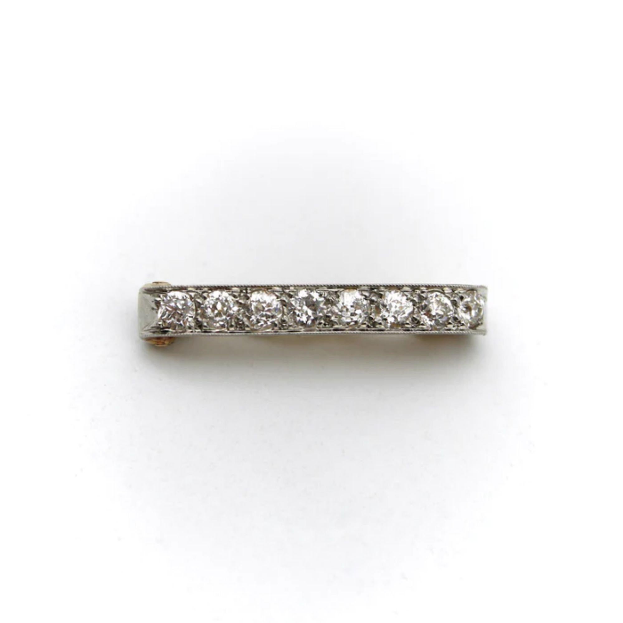14K Gold Platinum Topped Old Mine Cut Diamond Bar Pin

This Edwardian 14k gold bar pin is platinum topped with a line of diamonds bead set and surrounded by milgrain work. The tightly packed chunky diamonds catch the light beautifully, and the