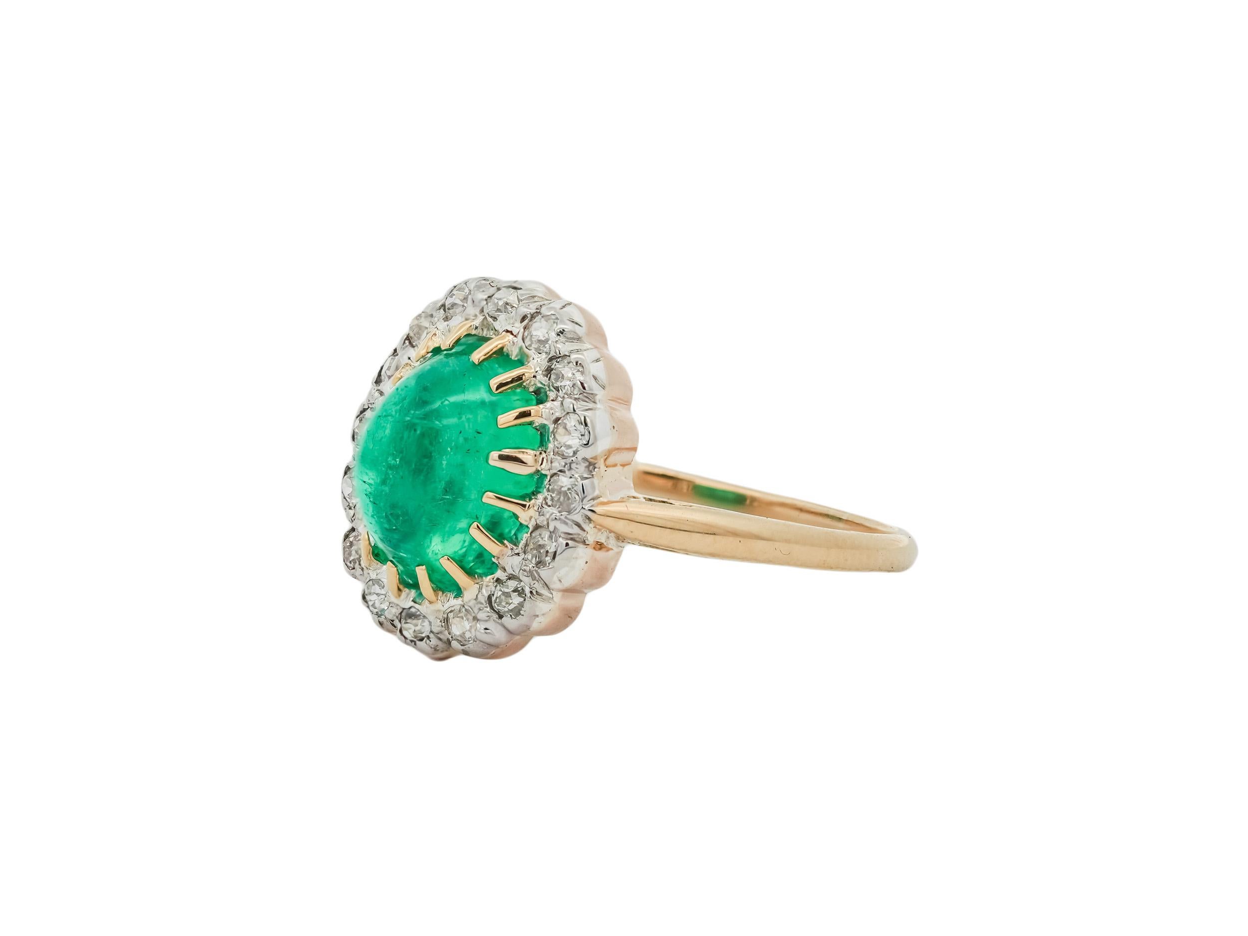 Era: Late Victorian to Early Edwardian c. 1895-1905

Metal: Platinum and 14K Yellow Gold

Stones: 

Emerald Total Carat Weight: 2.30 Carats
Diamond Total Carat Weight: 0.25 Carats
Measurements: 

Length: 14.4 mm 
Width: 12.4 mm 
Shank Width: 1.5 mm