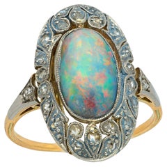Edwardian 14k/Platinum Opal
Diamond Halo Ring Edwardian 14k/Platinum Opal
Diamond Halo Ring