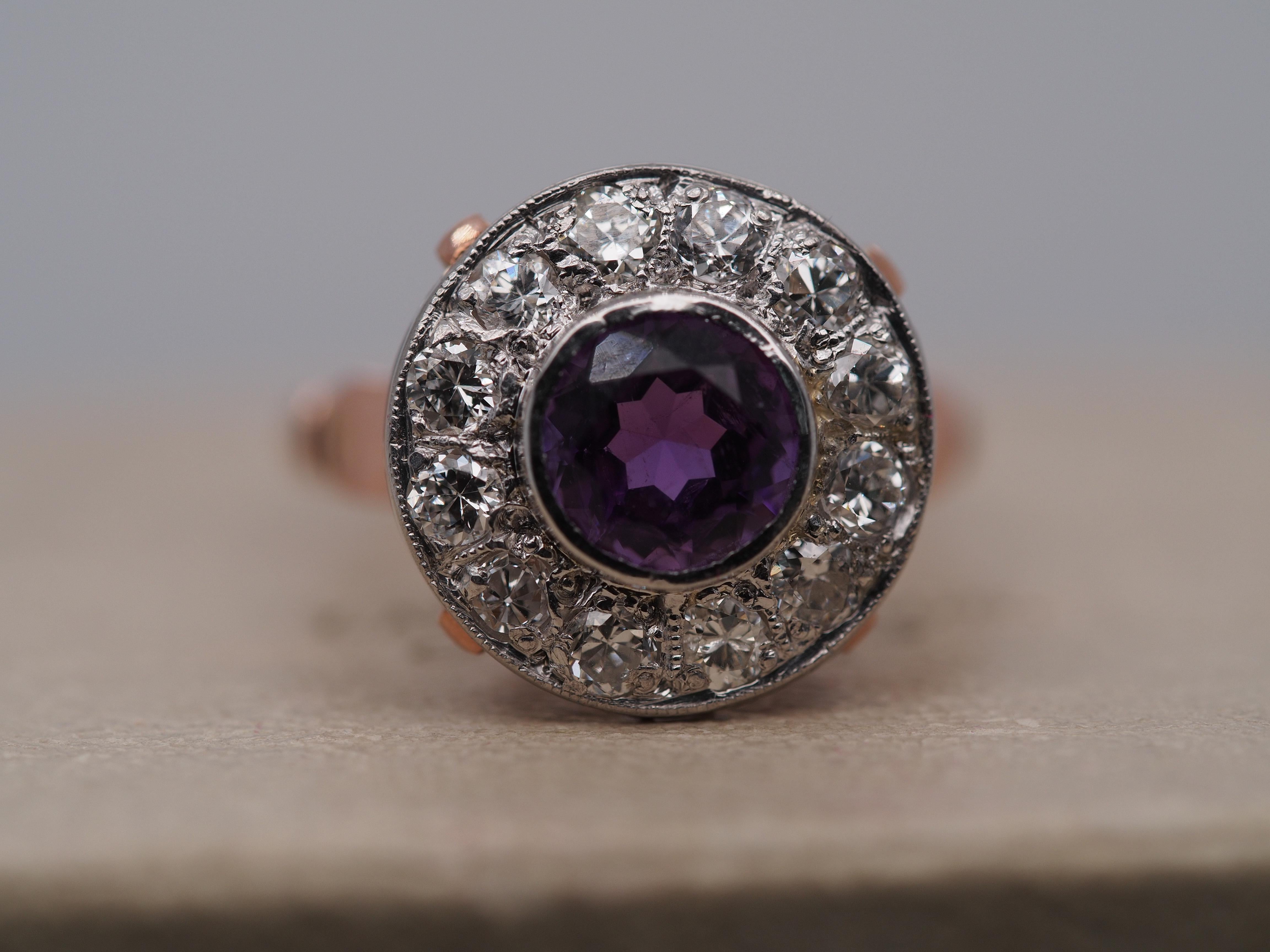 Item Details:
Ring Size: 7
Metal Type: 14k Rose Gold [Hallmarked, and Tested]
Weight: 4.8 grams
Diamond Details: Old European Cut, Natural, G Color, VS Clarity, .75ct total weight.
Amethyst: 1.00ct, Natural, Round
Band Width: 2.4mm
Condition: