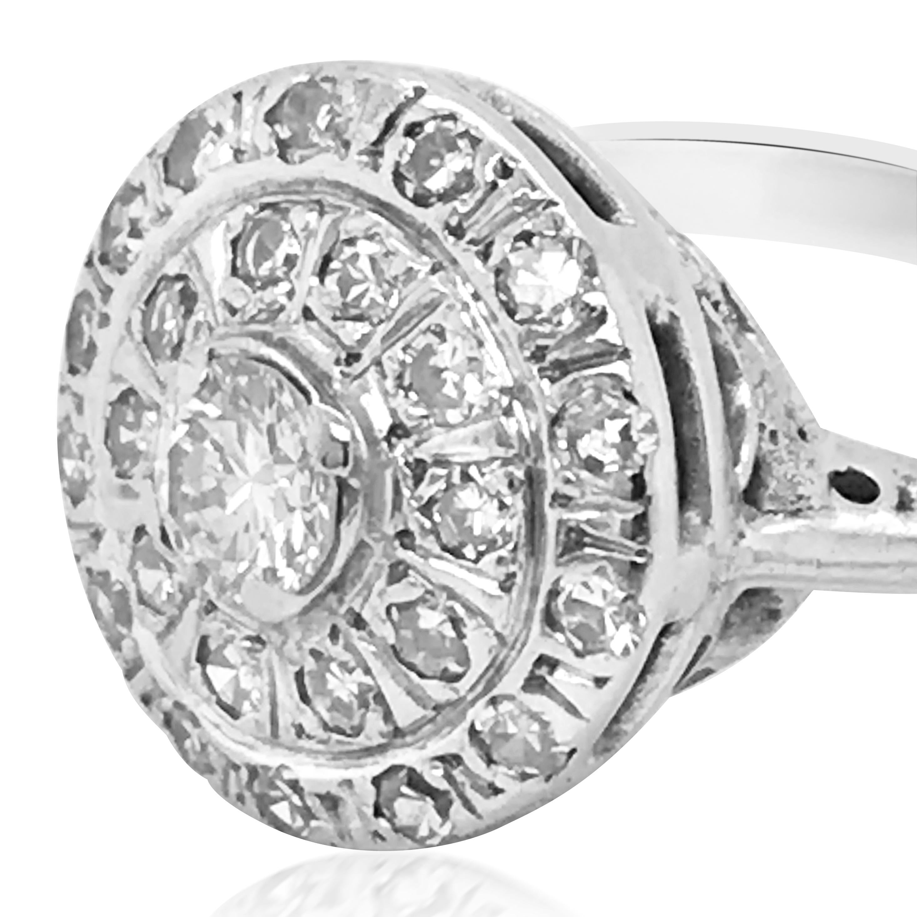 Center round diamond 0.2ct, 25 round diamonds total approx. 0.3ct.
Ring size: 7.25
Weight: 3.3 grams