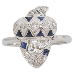 Eichelring aus 14 Karat Weißgold mit Diamant im alteuropäischen Schliff und blauem Saphir