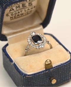 Edwardian 1.50 Carat Cushion Cut Sapphire Ring. 0.5ct Diamond Halo Ring Platinum
