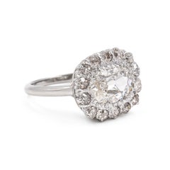 Edwardian 1.50 Carat GIA Cushion Cut Diamond Cluster Engagement Ring