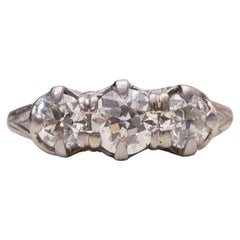 Antique Edwardian 1.50 Carat VVS Old European Diamond Three-Stone Platinum Filigree Ring