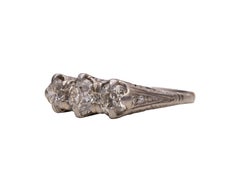 Edwardian 1.50 Carat VVS Old European Diamond Three-Stone Platinum Filigree Ring