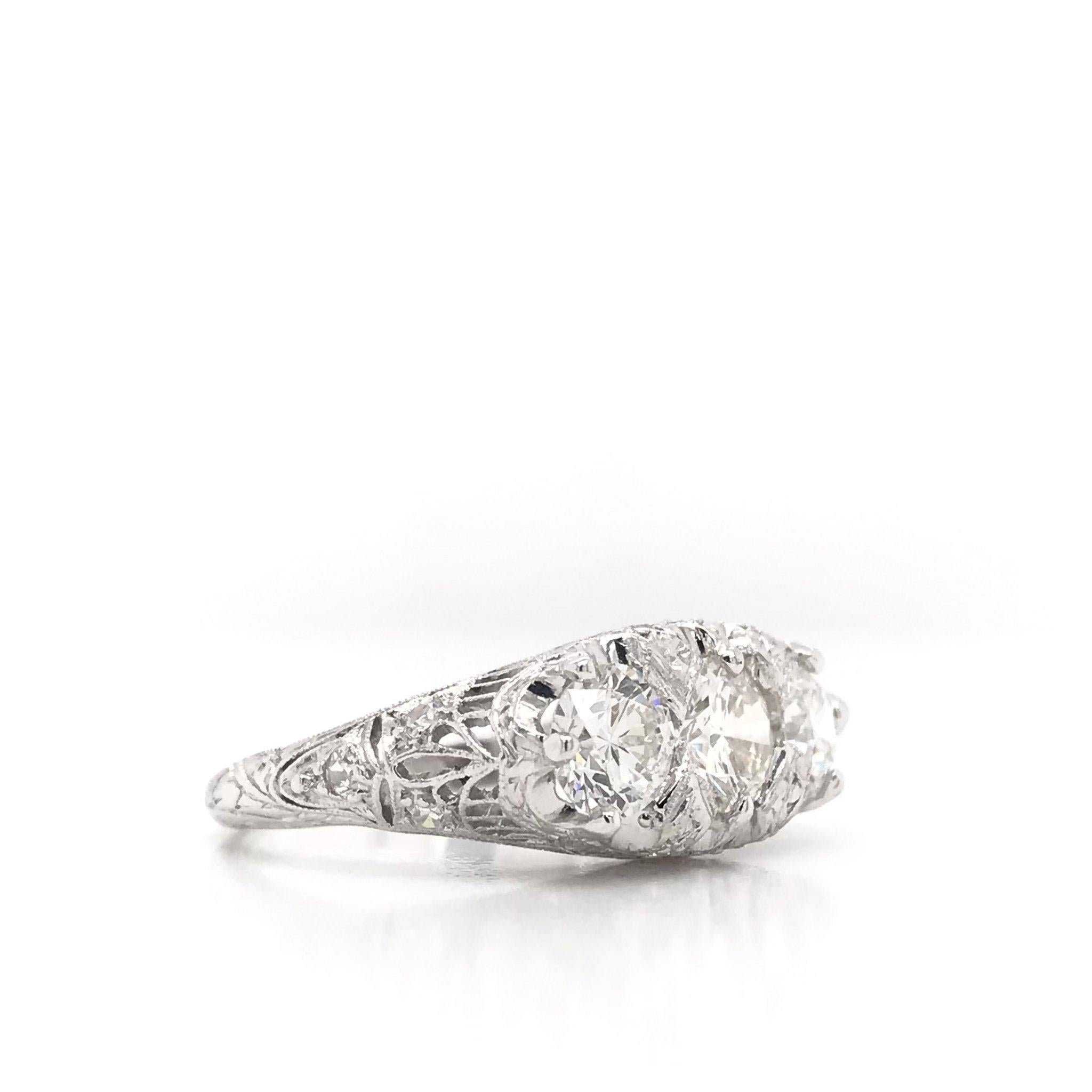 Women's Edwardian 1.55 Carat Three-Stone Diamond Platinum Filigree Engagement Ring