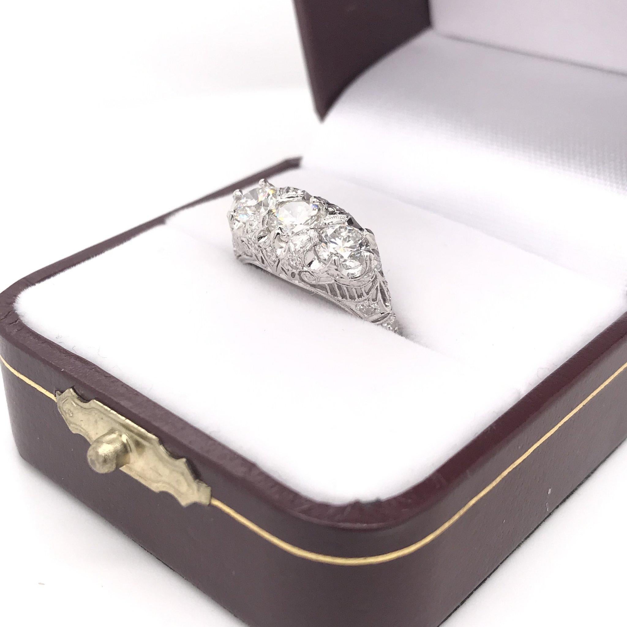 Edwardian 1.55 Carat Three-Stone Diamond Platinum Filigree Engagement Ring 3