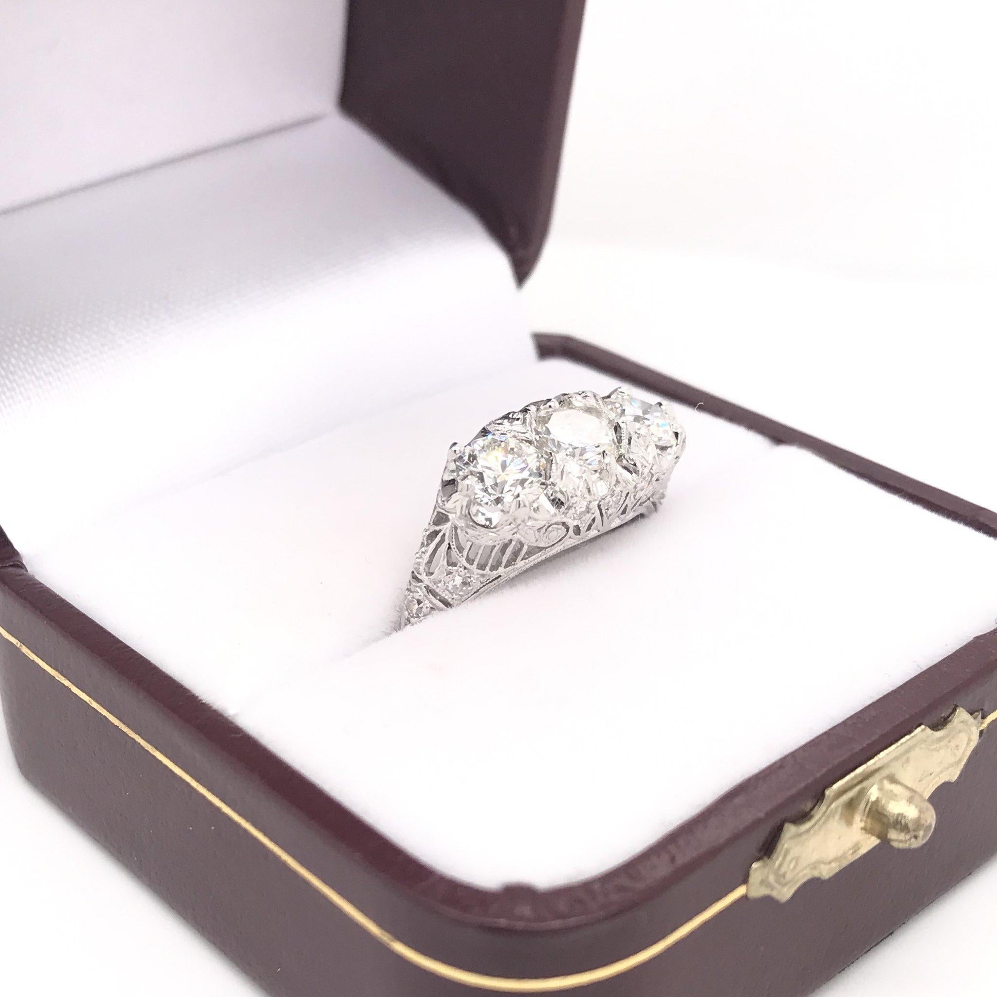 Edwardian 1.55 Carat Three-Stone Diamond Platinum Filigree Engagement Ring 4