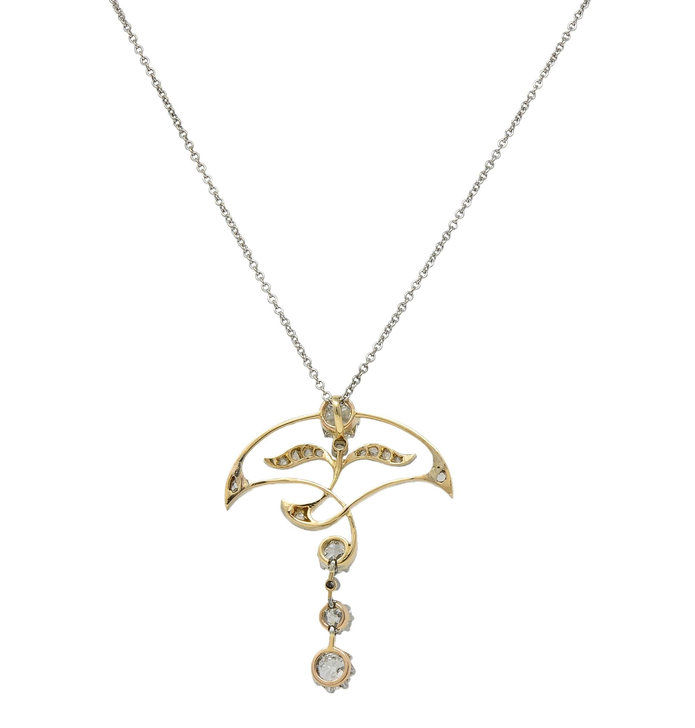 Collier pendentif édouardien ancien à fleurs en platine et or 14 carats avec diamants 1,55 carat poids total Unisexe en vente