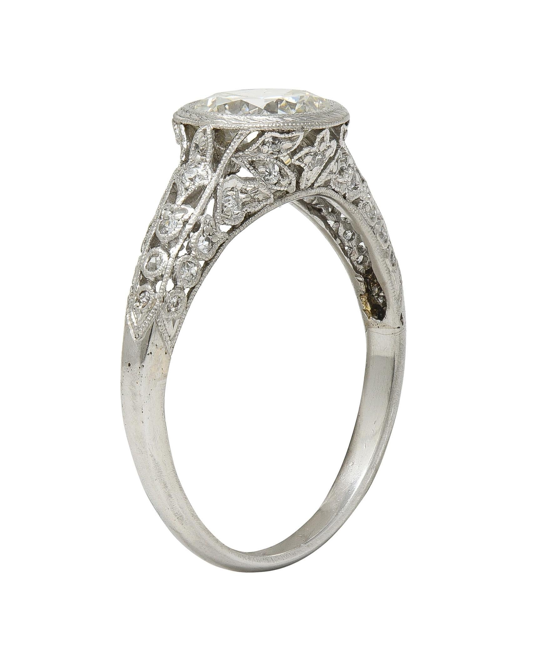 Old European Cut Edwardian 1.55 CTW Diamond Platinum Antique Lily-Of-The-Valley Engagement Ring For Sale