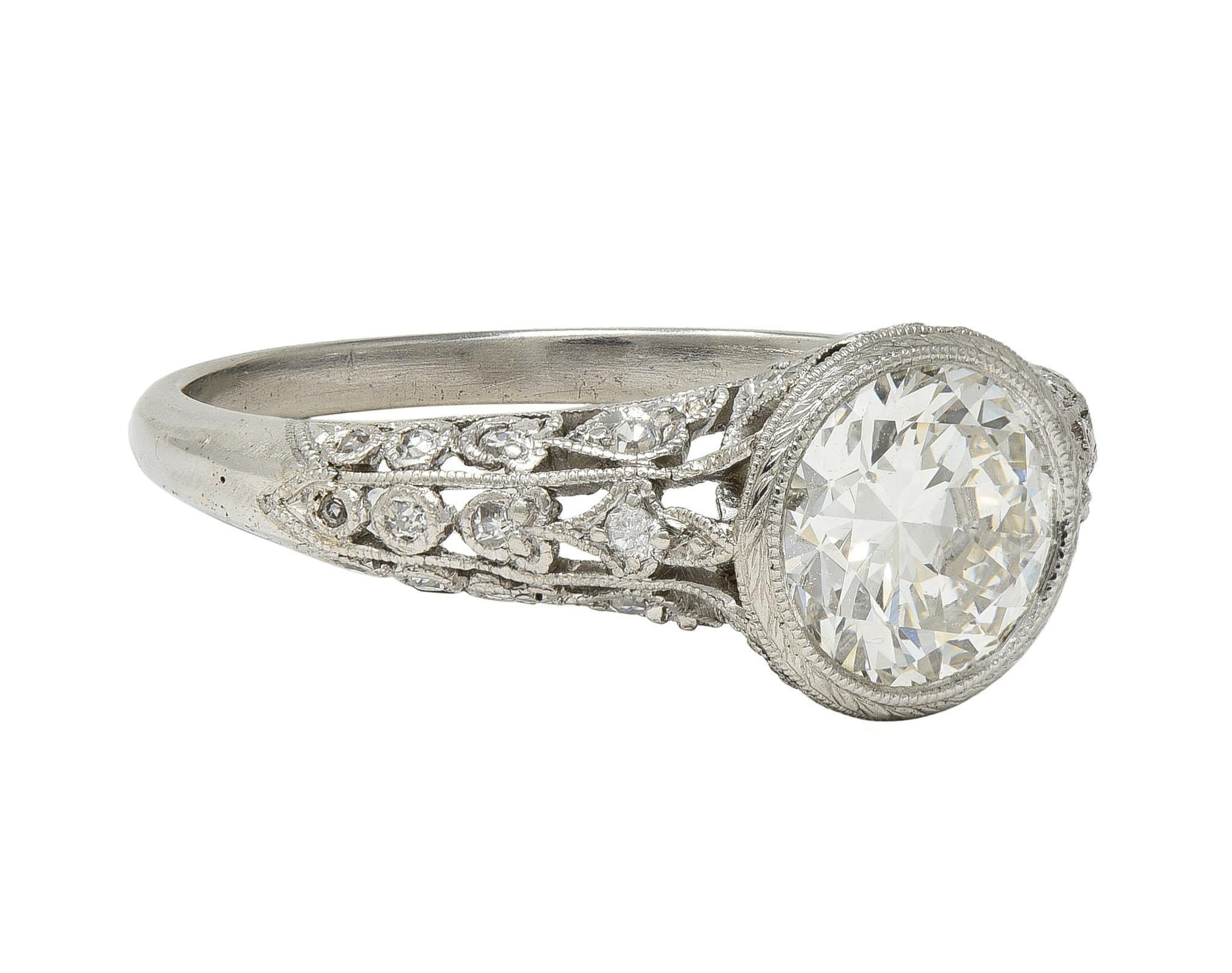 Edwardian 1.55 CTW Diamond Platinum Antique Lily-Of-The-Valley Engagement Ring In Excellent Condition For Sale In Philadelphia, PA