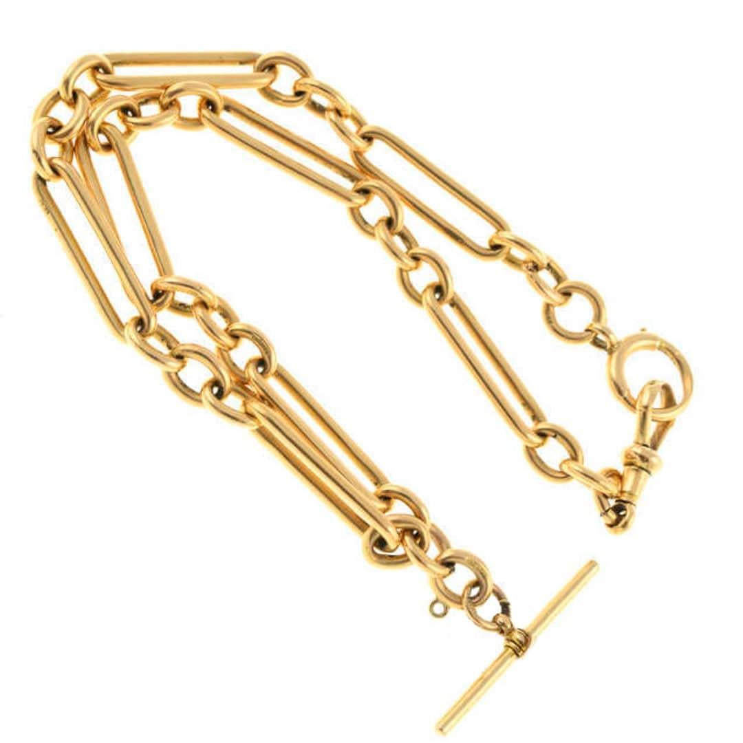 A super, heavy 15ct yellow gold antique Edwardian Albert chain with alternating trombone and three round uniform links. Every link is stamped ‘15.625’ along with the t-bar. The chain has one swivel 'dog' clasp and one large spring loaded jump/bolt