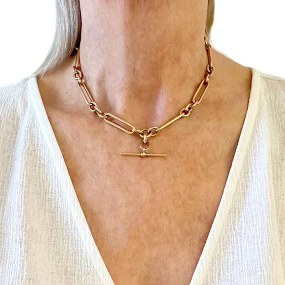 gold trombone link necklace