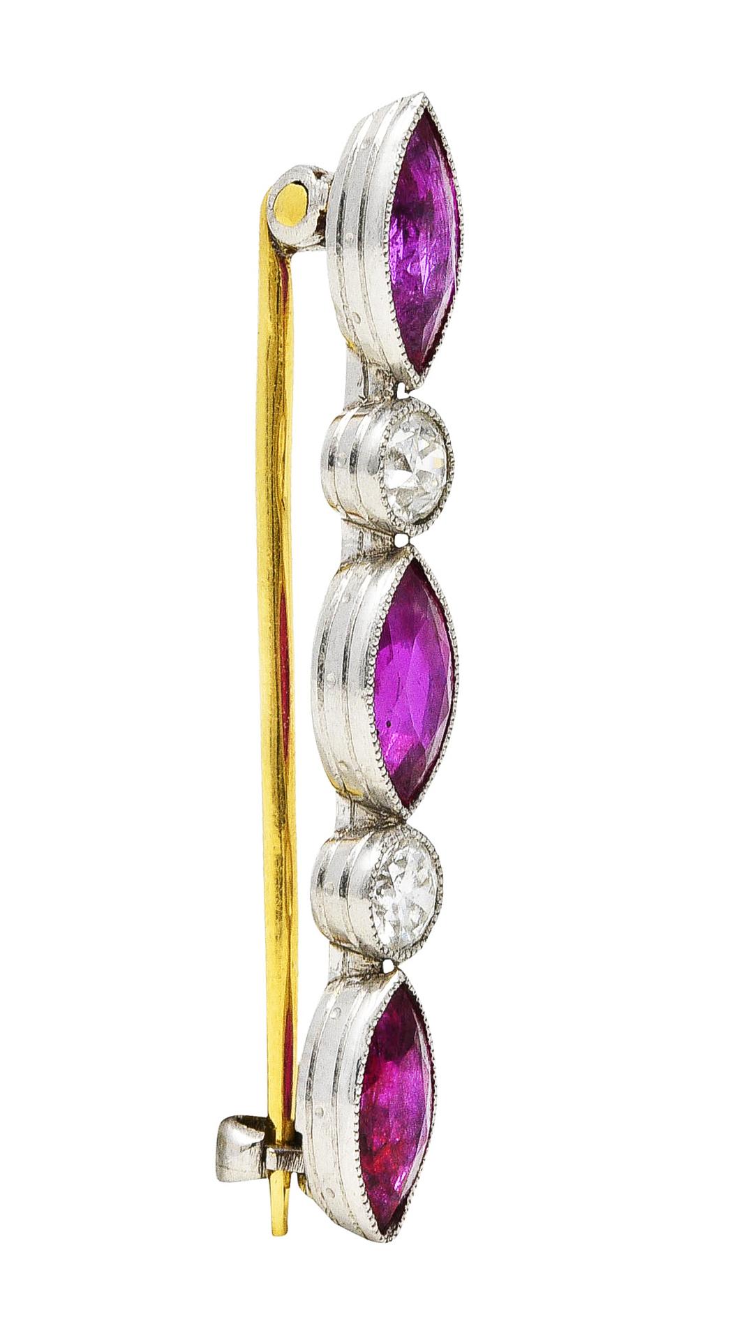 Bar brooch is comprised of bezel set geometric forms with milgrain edges

Featuring three marquise cut rubies weighing in total approximately 1.35 carats

Very well matched in strongly pinkish red color and semi-transparent with natural