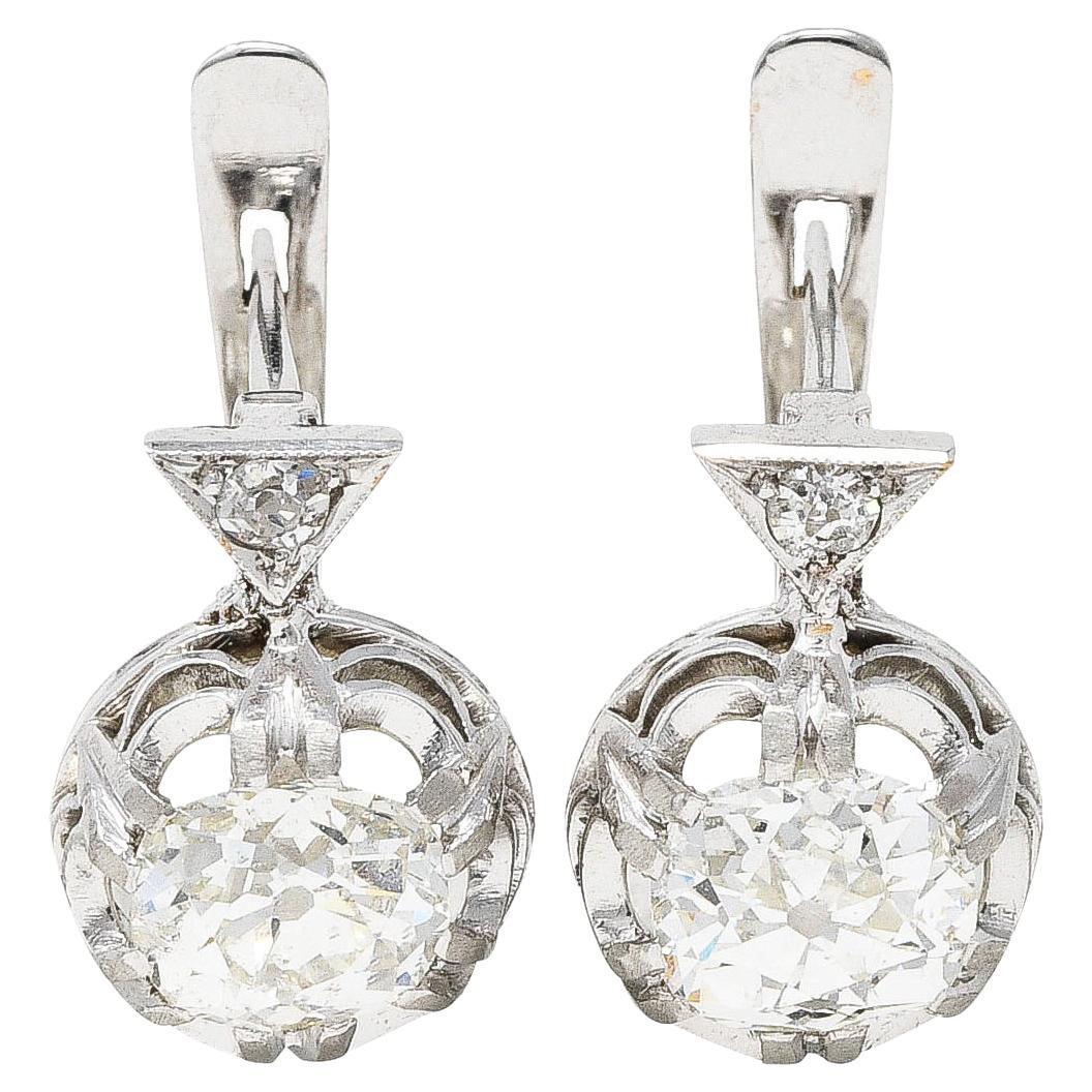 Boucles d'oreilles édouardiennes huggies en or 18 carats et platine avec diamants taille vieille mine de 1,75 carat en vente