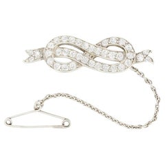 Edwardian 1.78ct Diamond infinity double knot brooch, c.1910s