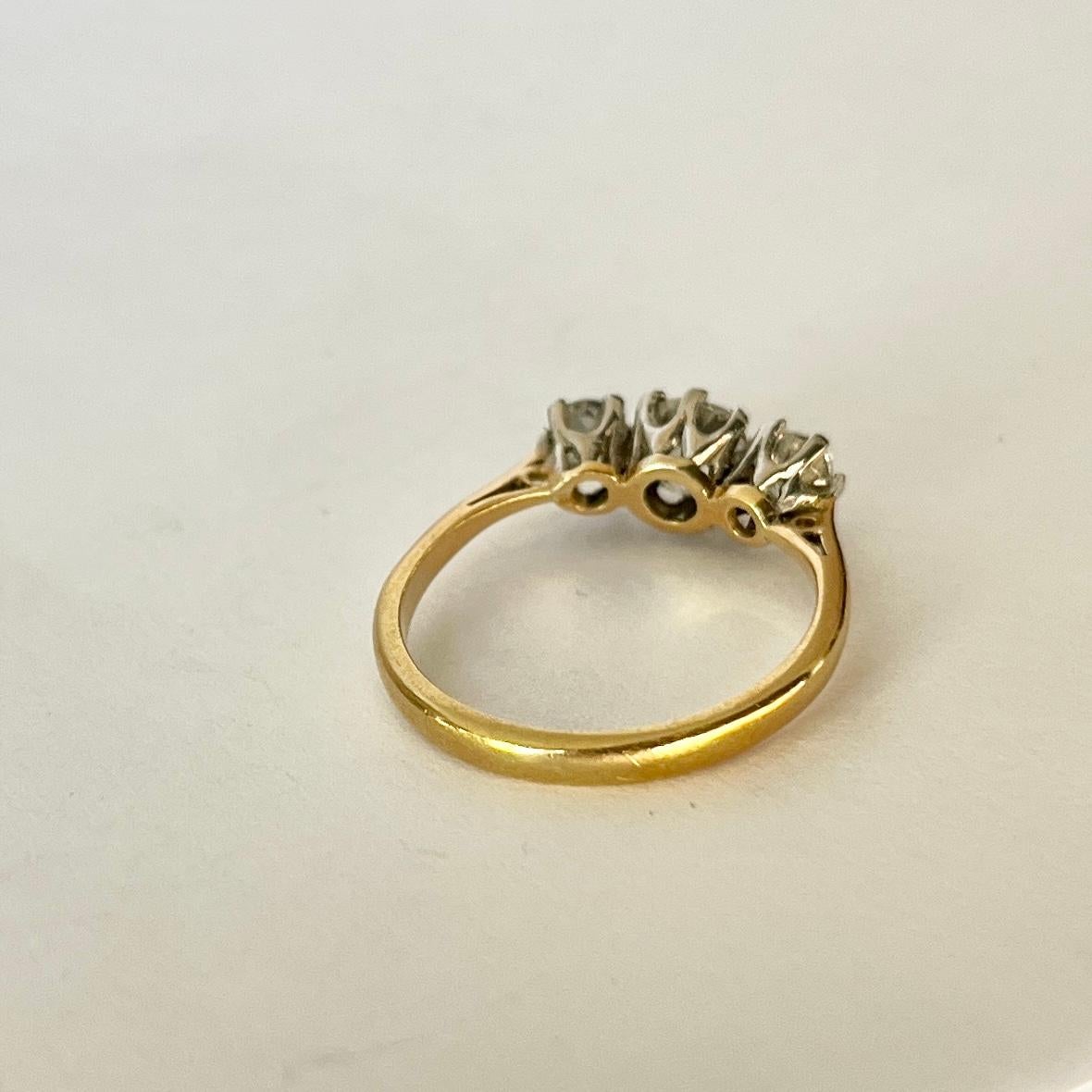 Edwardian 18 Carat Gold and Platinum Old Cut Diamond Three-Stone Ring In Good Condition For Sale In Chipping Campden, GB