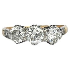 Antique Edwardian 18 Carat Gold and Platinum Old European Cut Diamond Three-Stone Ring