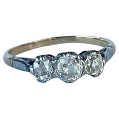 Edwardian 18 Carat Gold and Platinum Old Mine Cut Diamond Three-Stone Ring