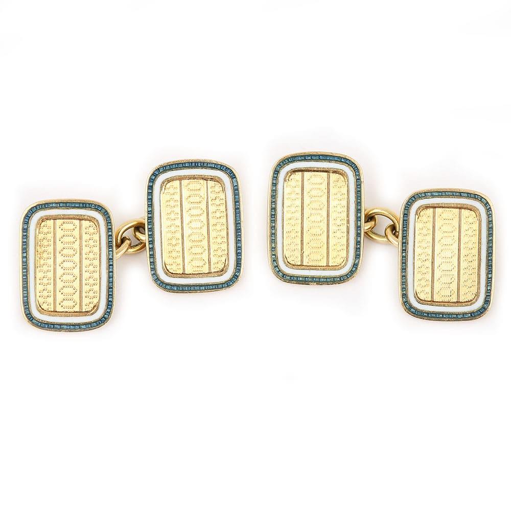 These excellent cufflinks are Edwardian and feature a fantastic combination of bright 18k yellow gold and white and blue enamel borders. The panels are rectangular with engine turned center detailing in combination with a delicate enamelled edge.