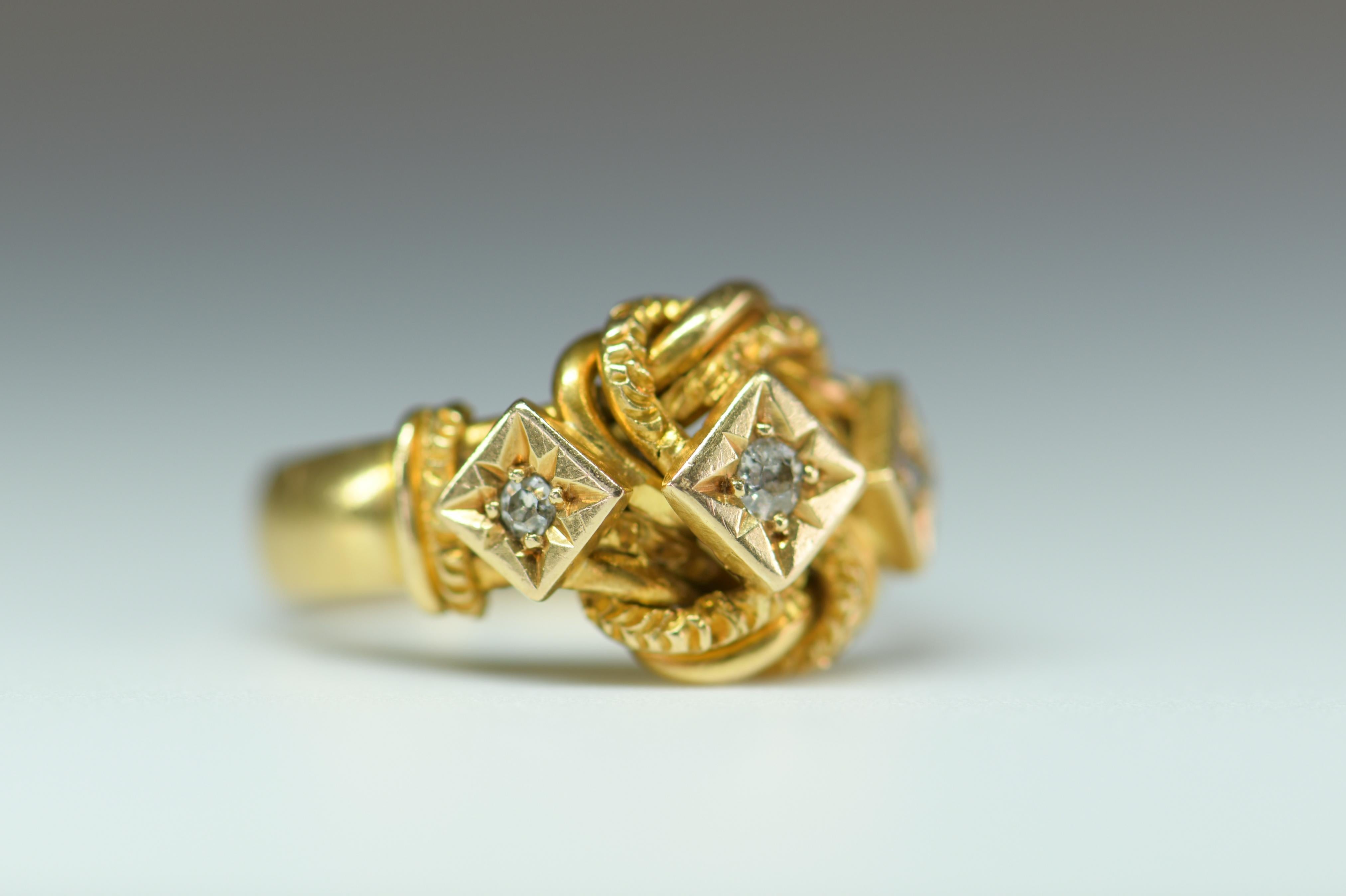 A good heavy 18ct gold love knot ring that was made in Birmingham in 1912. At that time knot rings were very popular as they literally meant “Tying the knot” that bound two people together. It has been set with three diamonds that further accentuate