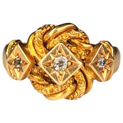 Antique Edwardian 18 Karat Gold Diamond Love Knot Ring