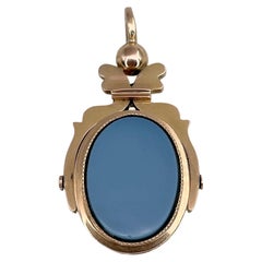 Collier pendentif édouardien à double bouton pivotant en or 18 carats et sardonyx gris et bleu