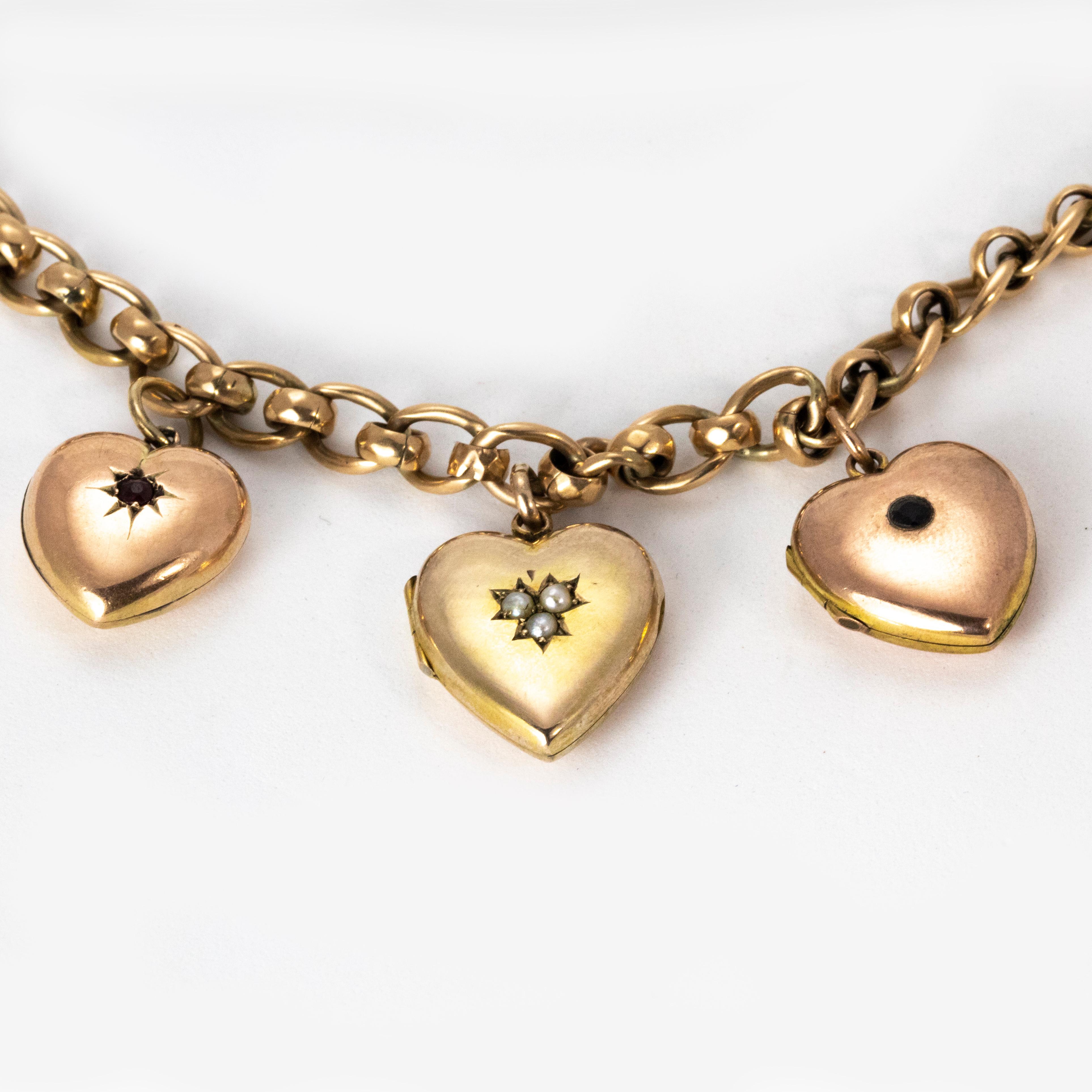 Federal Edwardian 18 Karat Gold Necklace with Pearl Sapphire and Ruby Set Heart Lockets