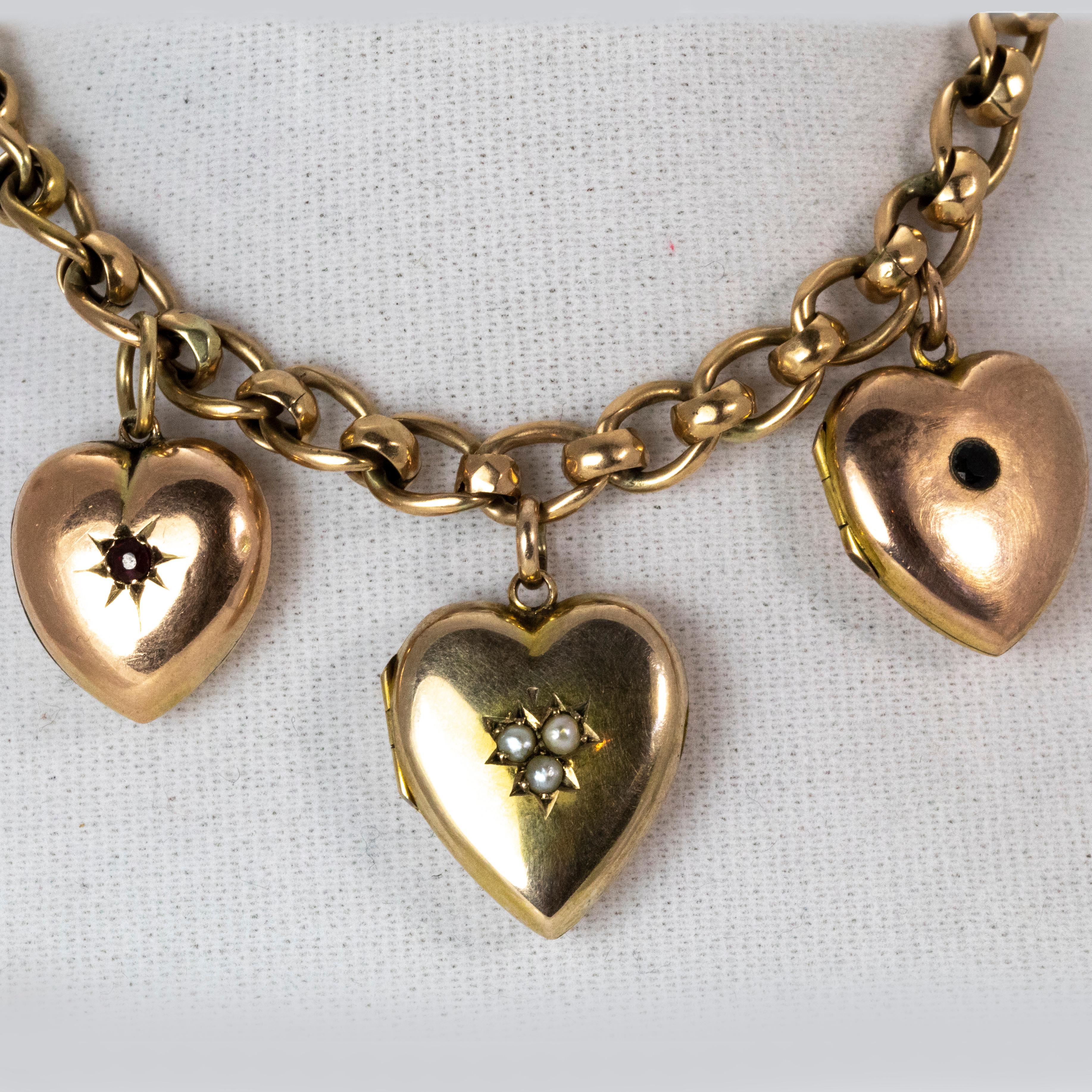 Round Cut Edwardian 18 Karat Gold Necklace with Pearl Sapphire and Ruby Set Heart Lockets