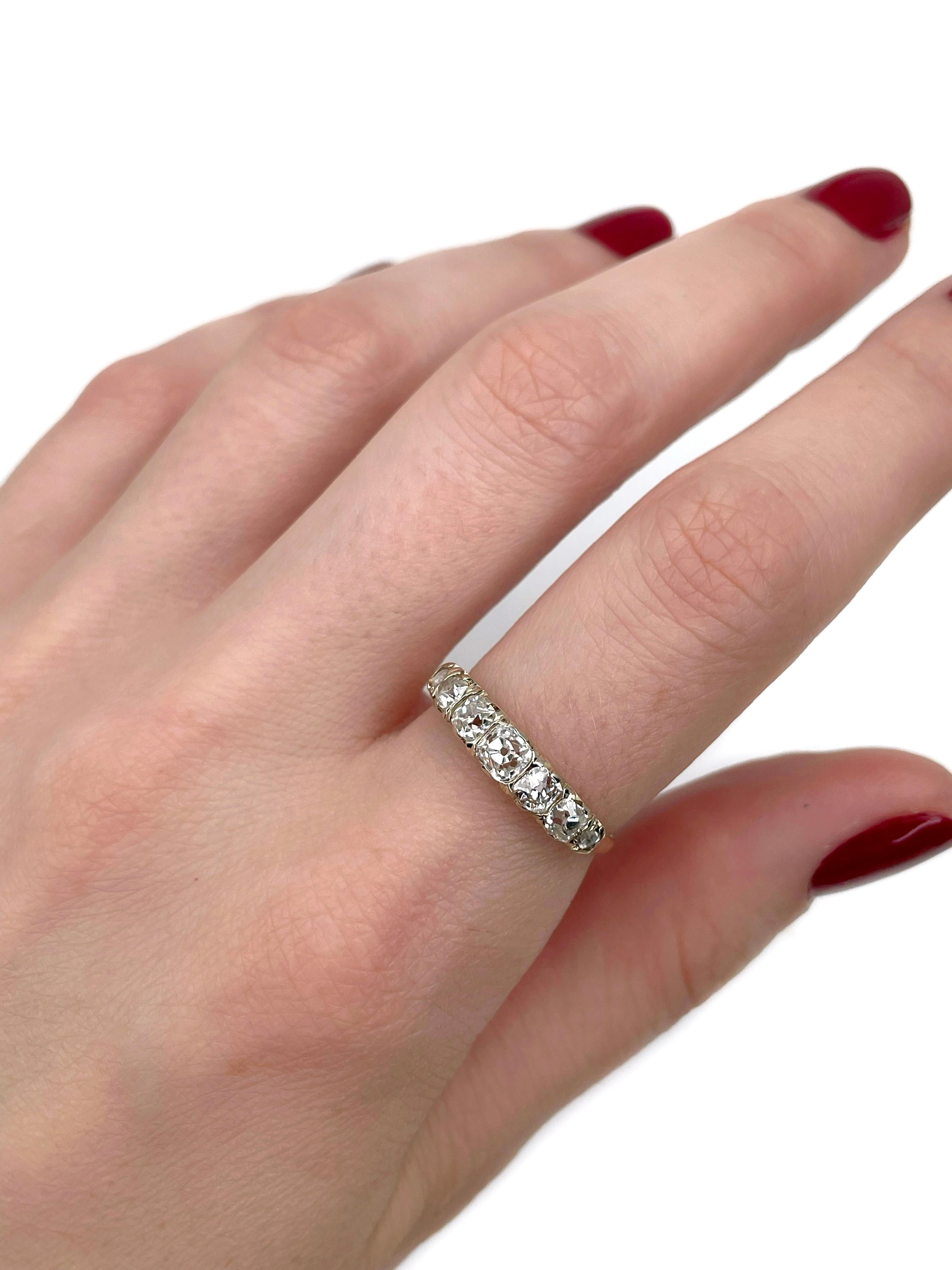 This is an Edwardian seven-stone band ring crafted in 18K gold. Circa 1900. 

It features:
- 5 diamonds (old mine cut, TW 1.00ct, RW+/W, SI-P2)
- 2 diamonds (antique cut, TW 0.04ct, RW+/RW, SI-P1) 

Weight: 2.44g
Size: 17.25 (US 6.75)

IMPORTANT: