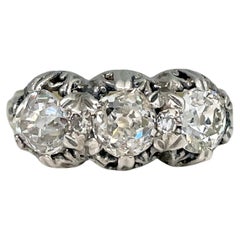 Edwardian 18 Karat Gold Old Mine Cut Diamond Three-Stone Ring