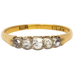 Edwardian 18 Karat Gold Platinum Five-Stone Diamond Ring