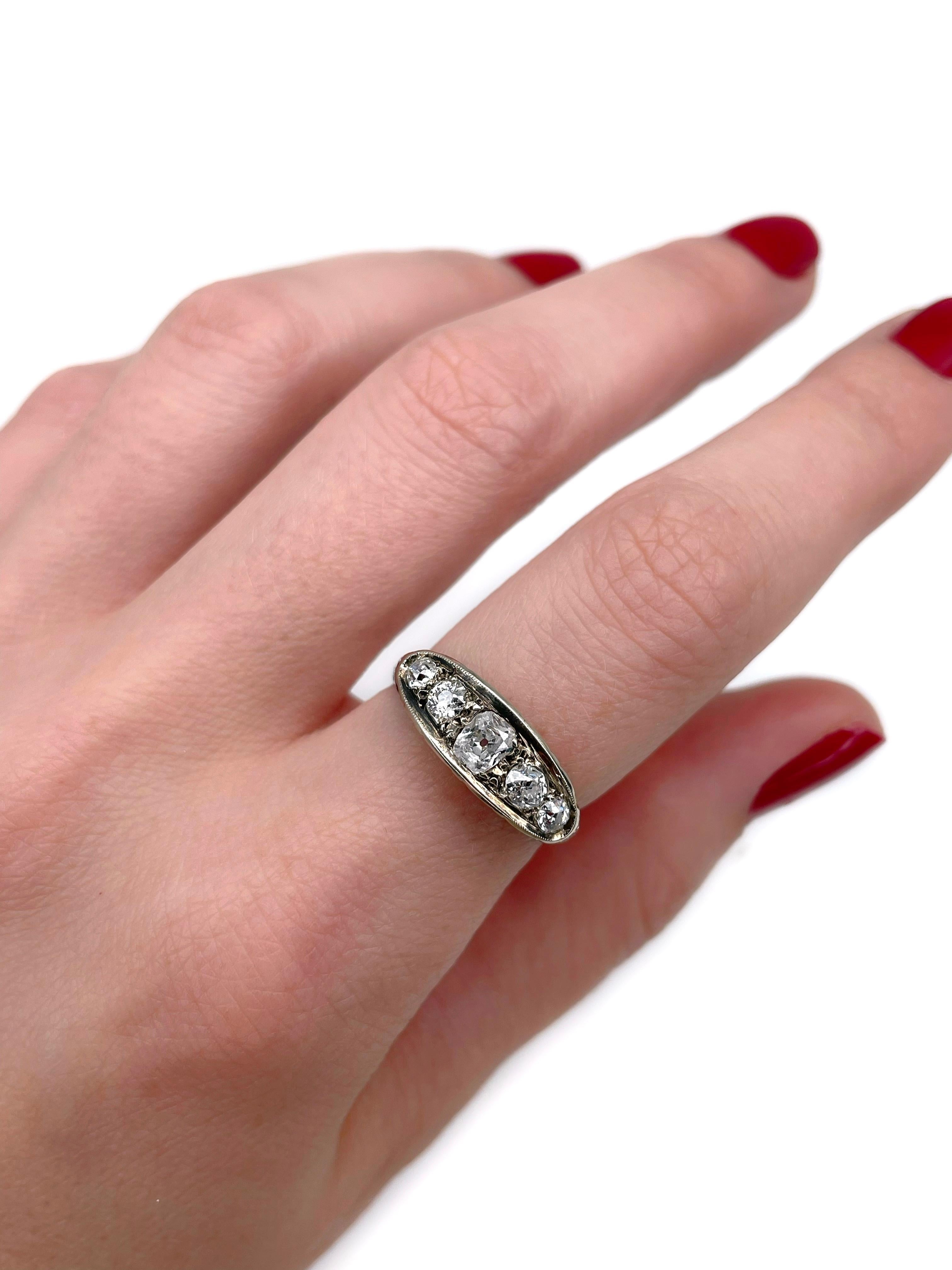 This is an Edwardian five-stone band ring crafted in 18K gold. Circa 1910. 

The piece features diamonds (TW 0.60ct):
- 1 diamond, old mine cut, 0.25ct, RW-W, SI
- 4 diamonds, old cut, near round, TW 0.35ct, RW+/W, VS-SI

Weight: 3.14g 
Size: 16.5