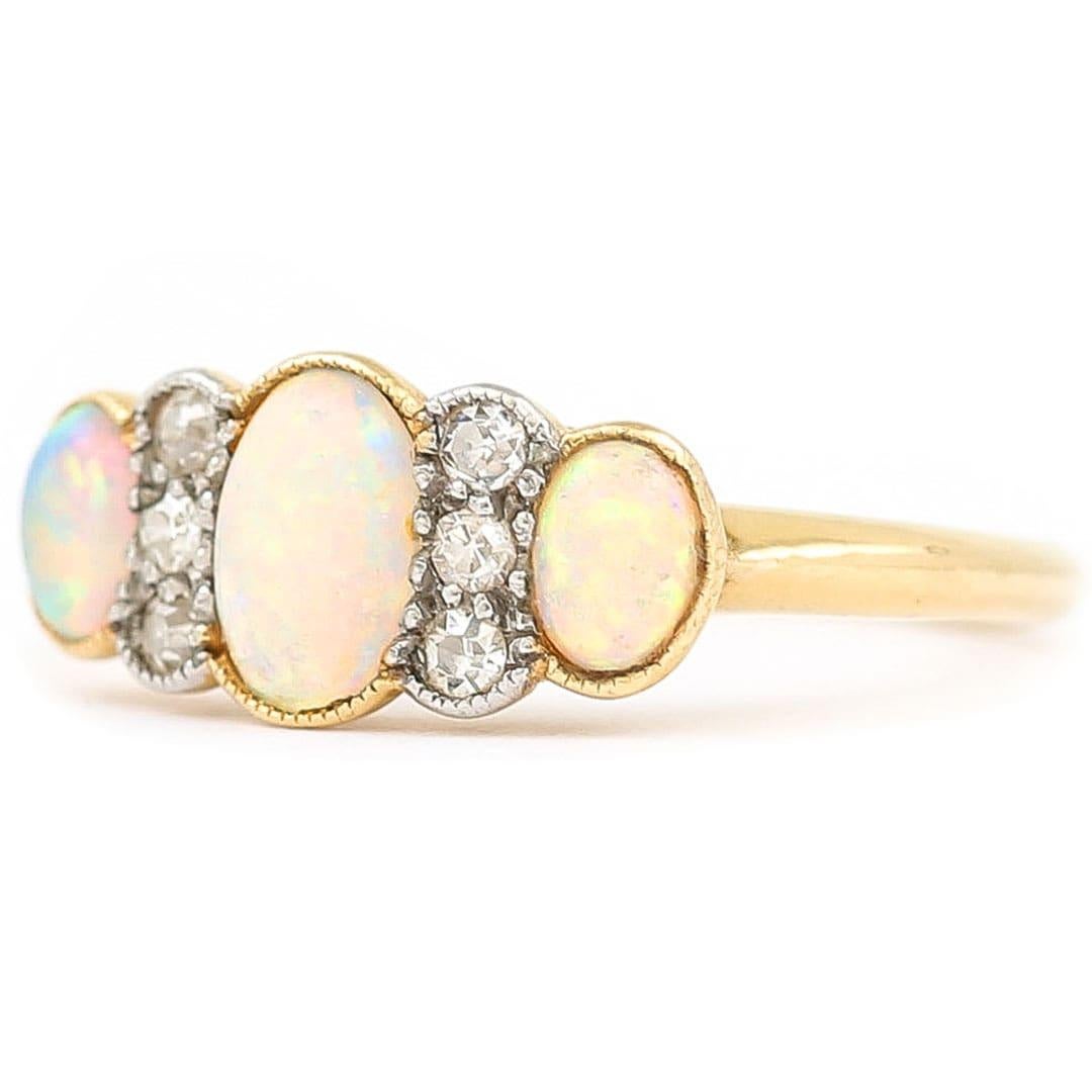 3 stone opal gold ring