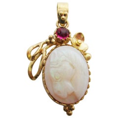 Edwardian 18 Karat Yellow Gold Ruby and Carved Opal Horse Pendant