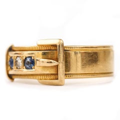 Edwardian 18 Karat Yellow Gold Sapphire and Diamond Buckle Ring, circa 1905