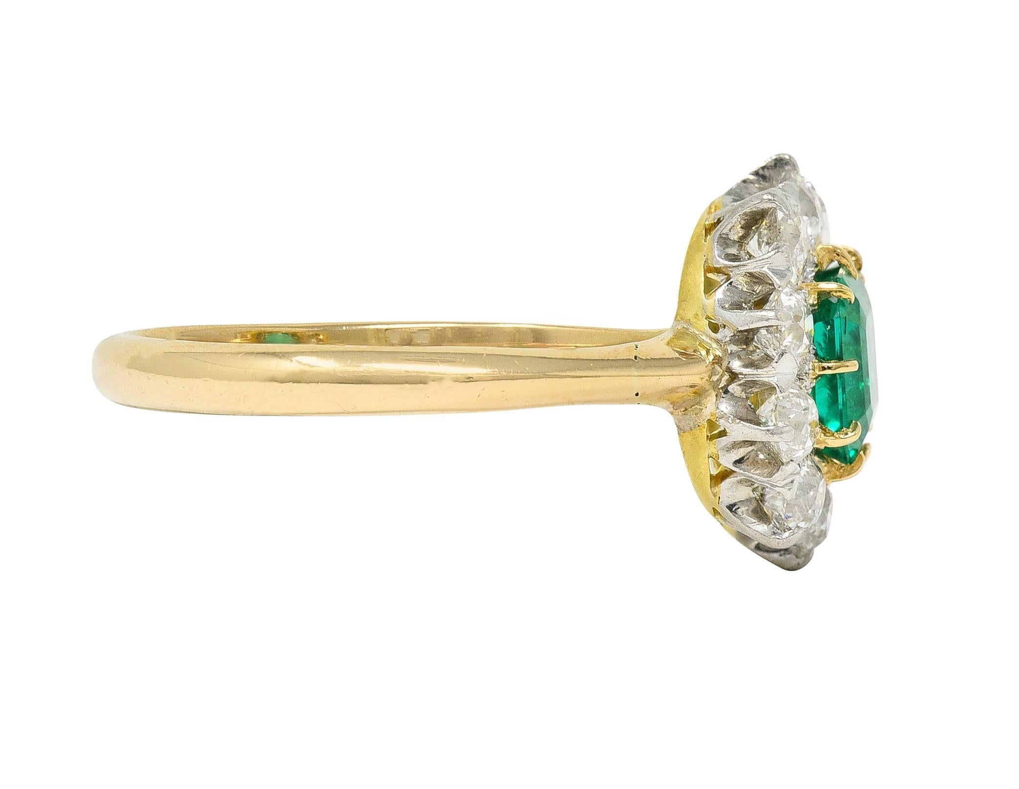 Edwardian 1.80 CTW Emerald Diamond Platinum 14K Yellow Gold Antique Halo Ring In Excellent Condition For Sale In Philadelphia, PA