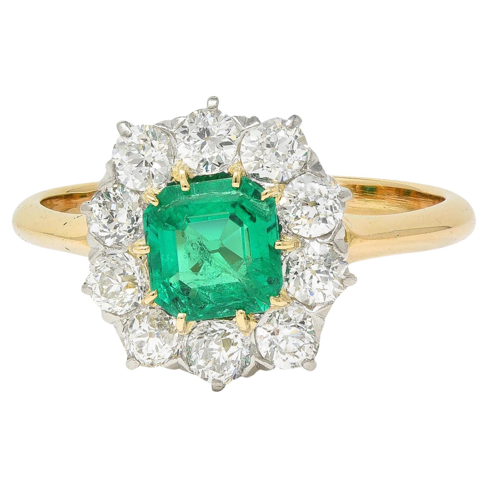Edwardian 1.80 CTW Emerald Diamond Platinum 14K Yellow Gold Antique Halo Ring For Sale