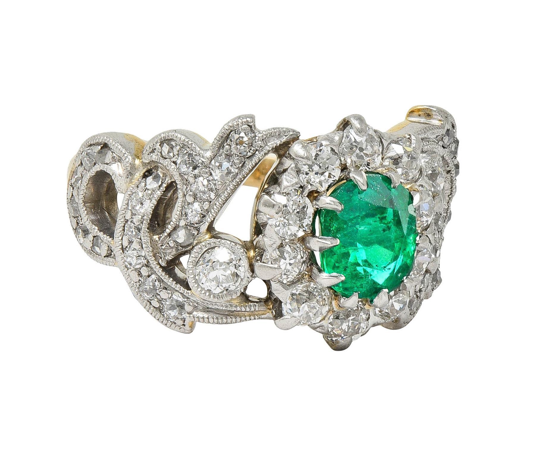 Round Cut Edwardian 1.85 CTW Emerald Diamond Platinum 14 Karat Gold Antique Halo Ring For Sale