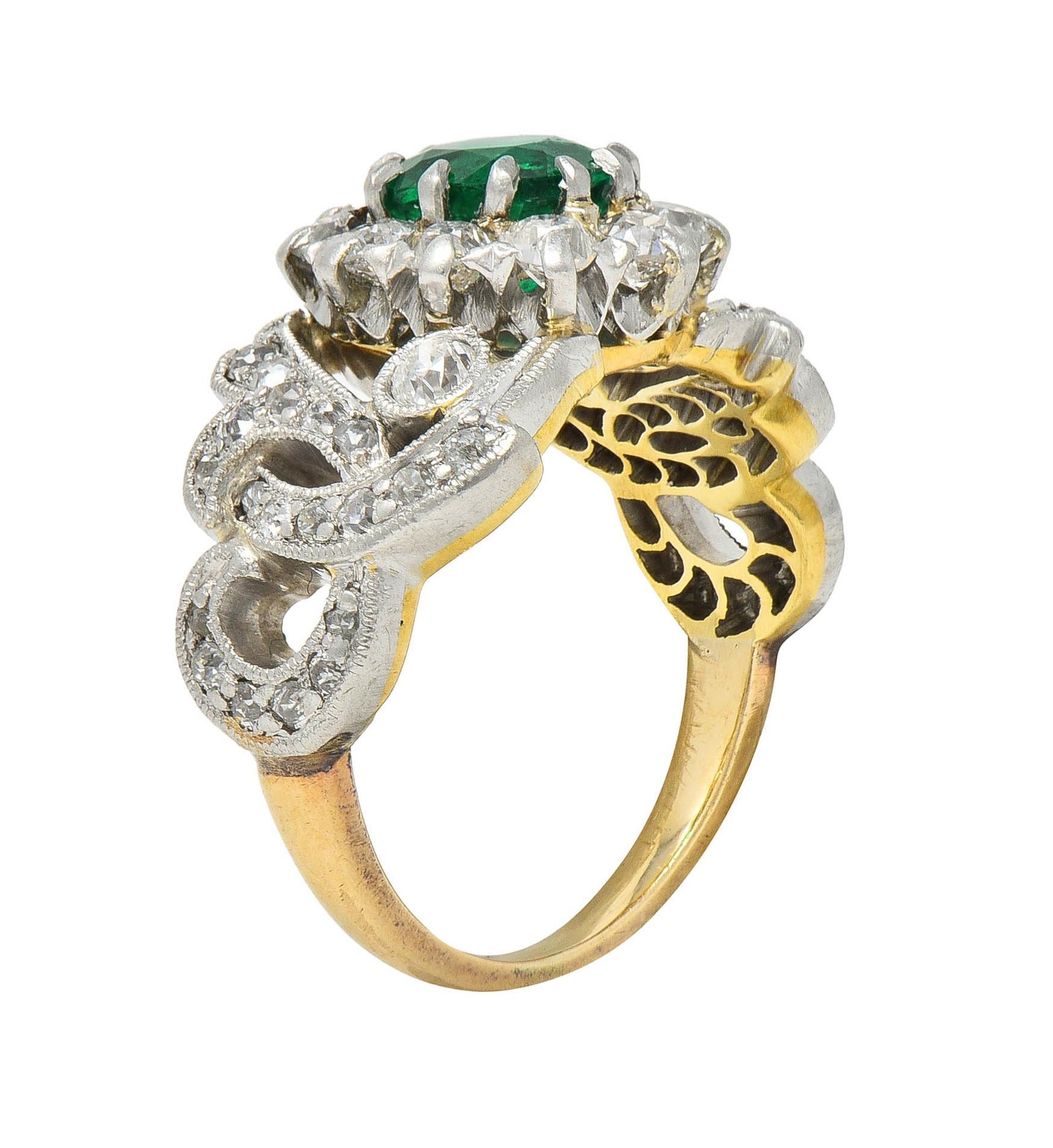 Edwardian 1.85 CTW Emerald Diamond Platinum 14 Karat Gold Antique Halo Ring In Excellent Condition For Sale In Philadelphia, PA